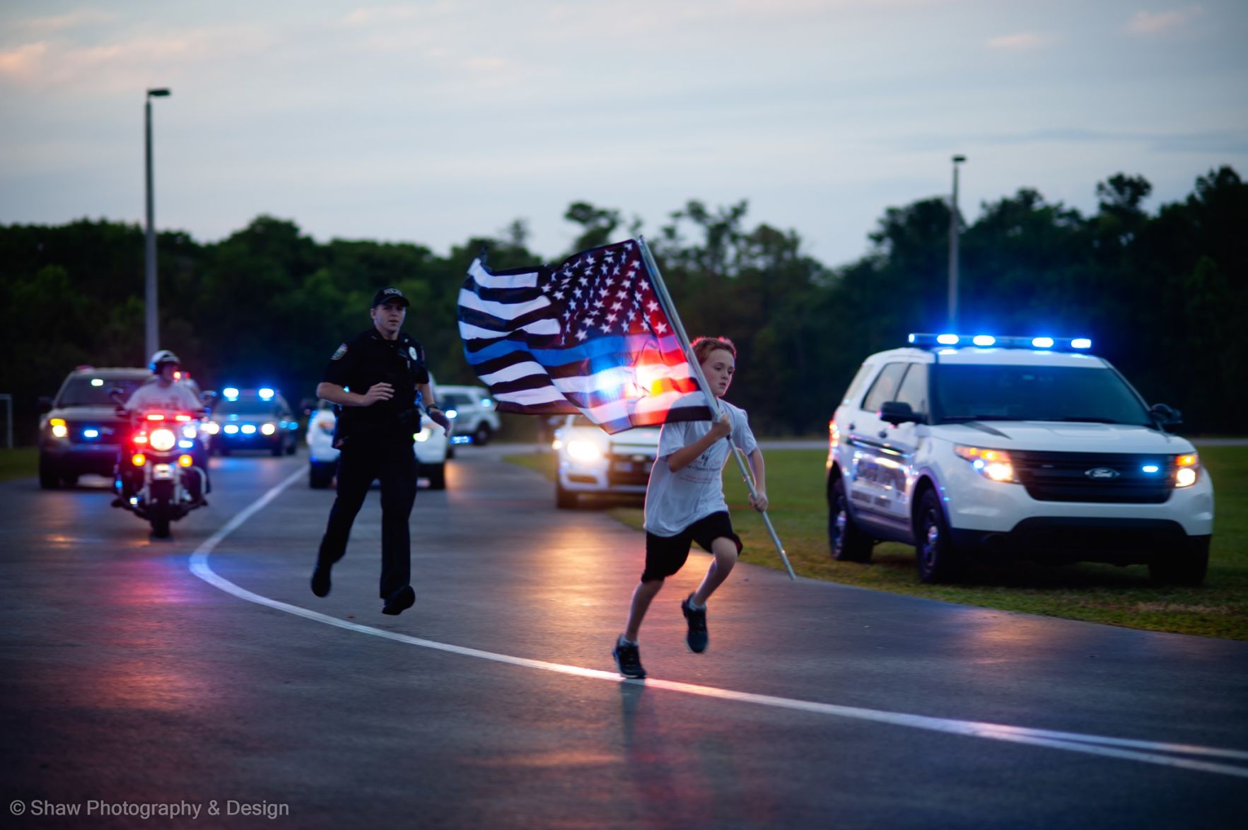 Niño conciudadano estadounidense corre en honor a policia caido en Manati - Foto Facebook Running for Heroes - mayo 28 2019